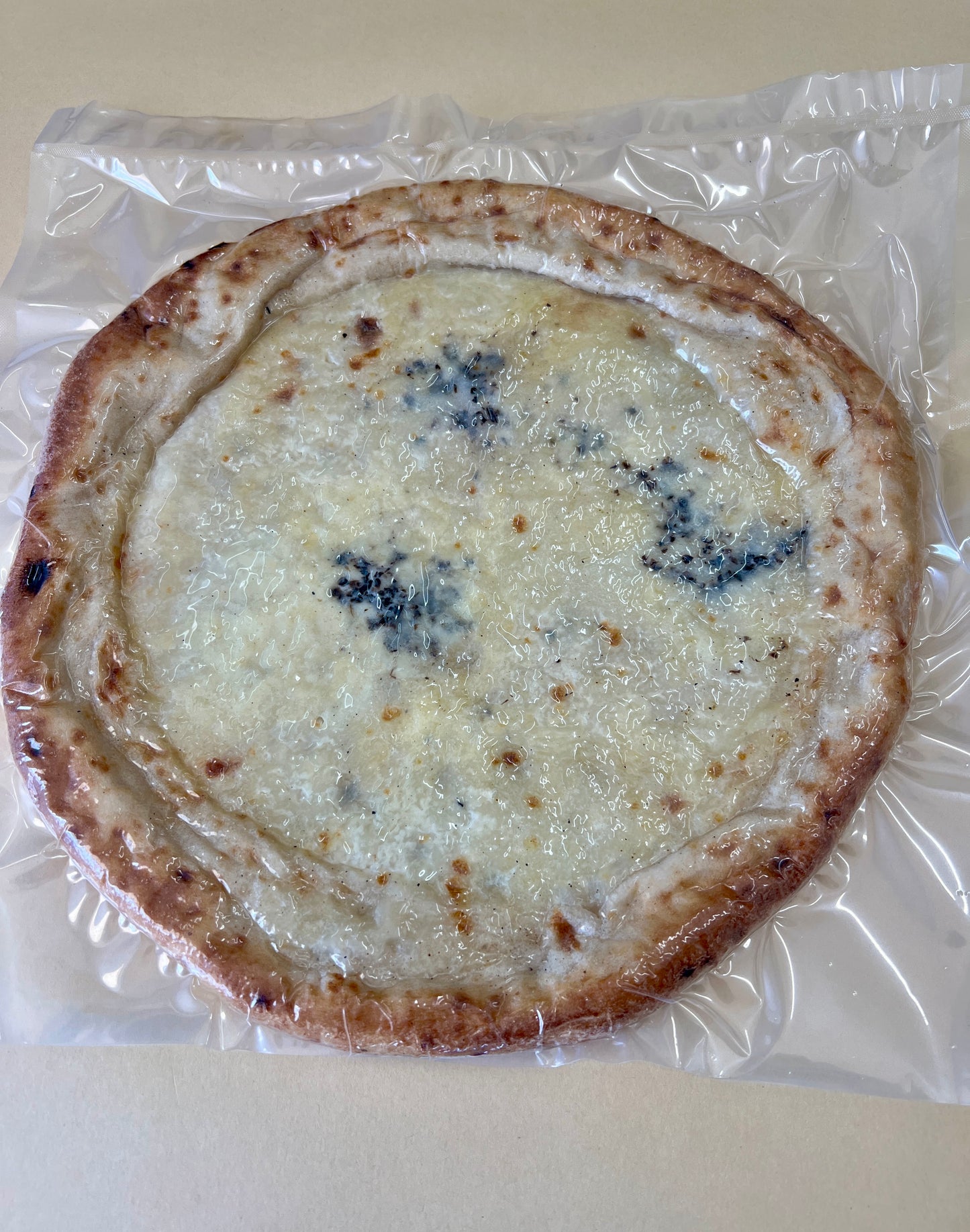 Organic pre-baked Cheese and Truffle Pizza